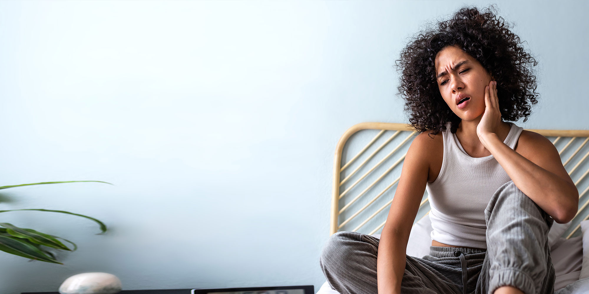 girl having mouth pain from root canal issues