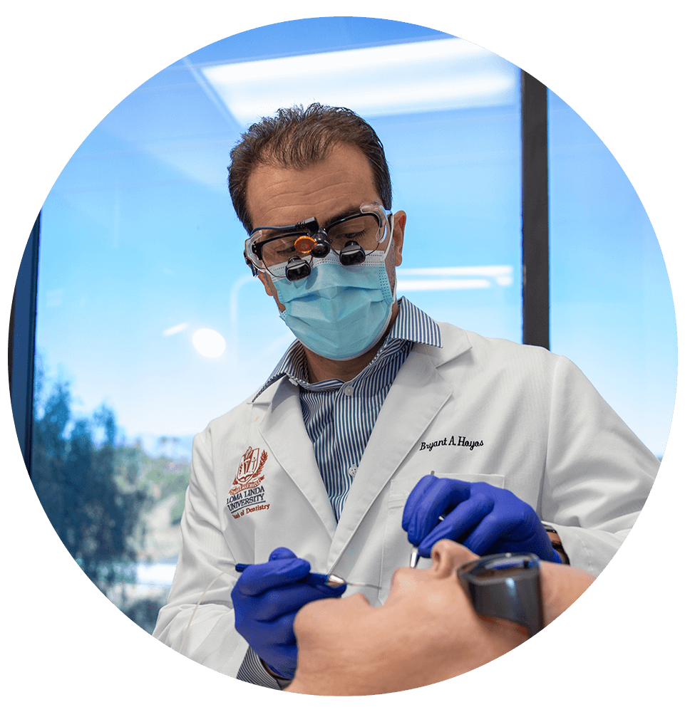 doctor performing treatment on patient