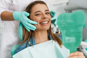 Dentist consulting with a patient about crowns and veneers