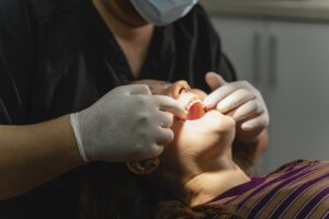 Patient consulting with dentist in a modern dental office