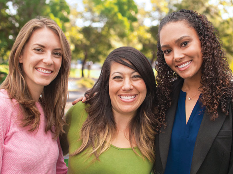 Three women enhoying the outdoors.